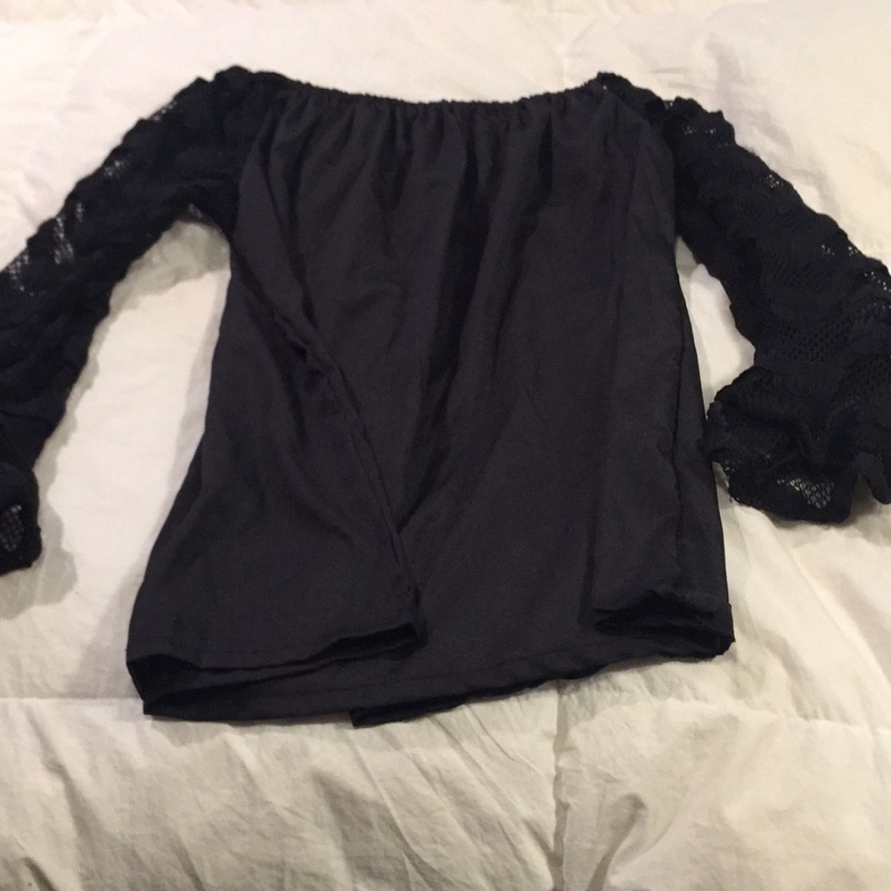 Loose fitting, lace sleeve, off the shoulder shirt